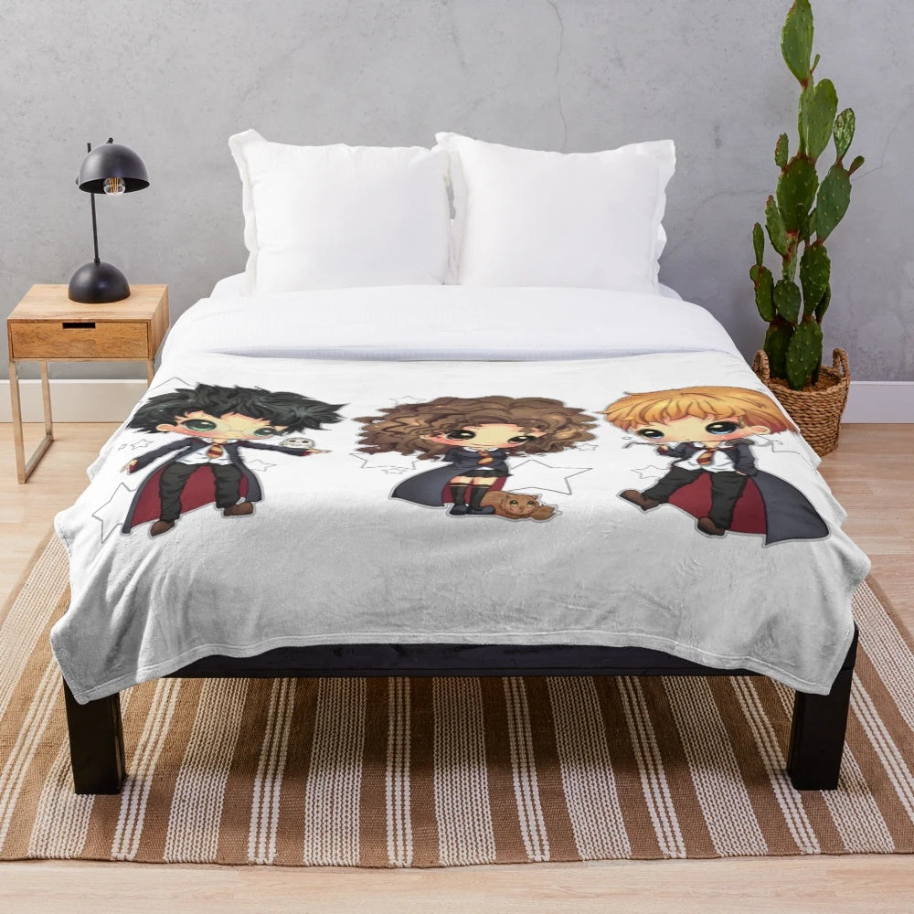 Plush blanket featuring movie heroes and film characters