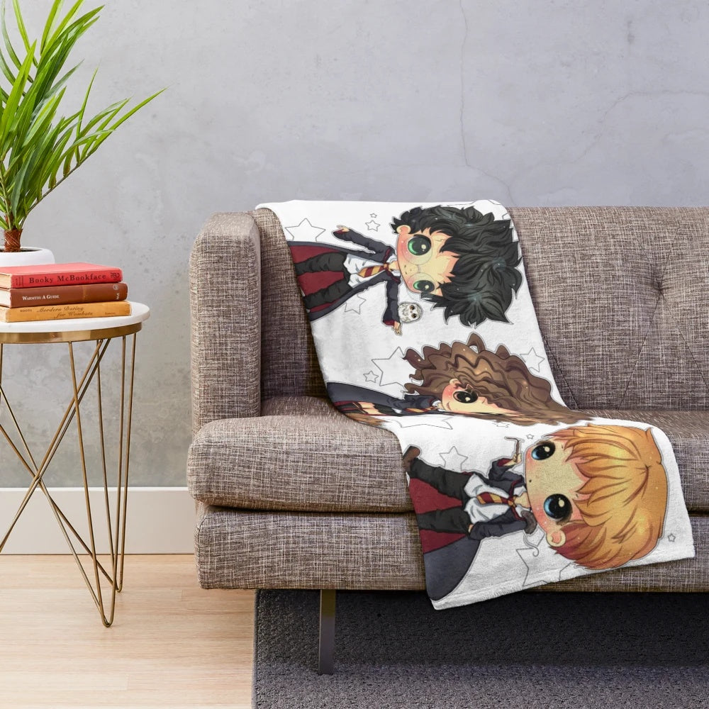Plush blanket featuring movie heroes and film characters