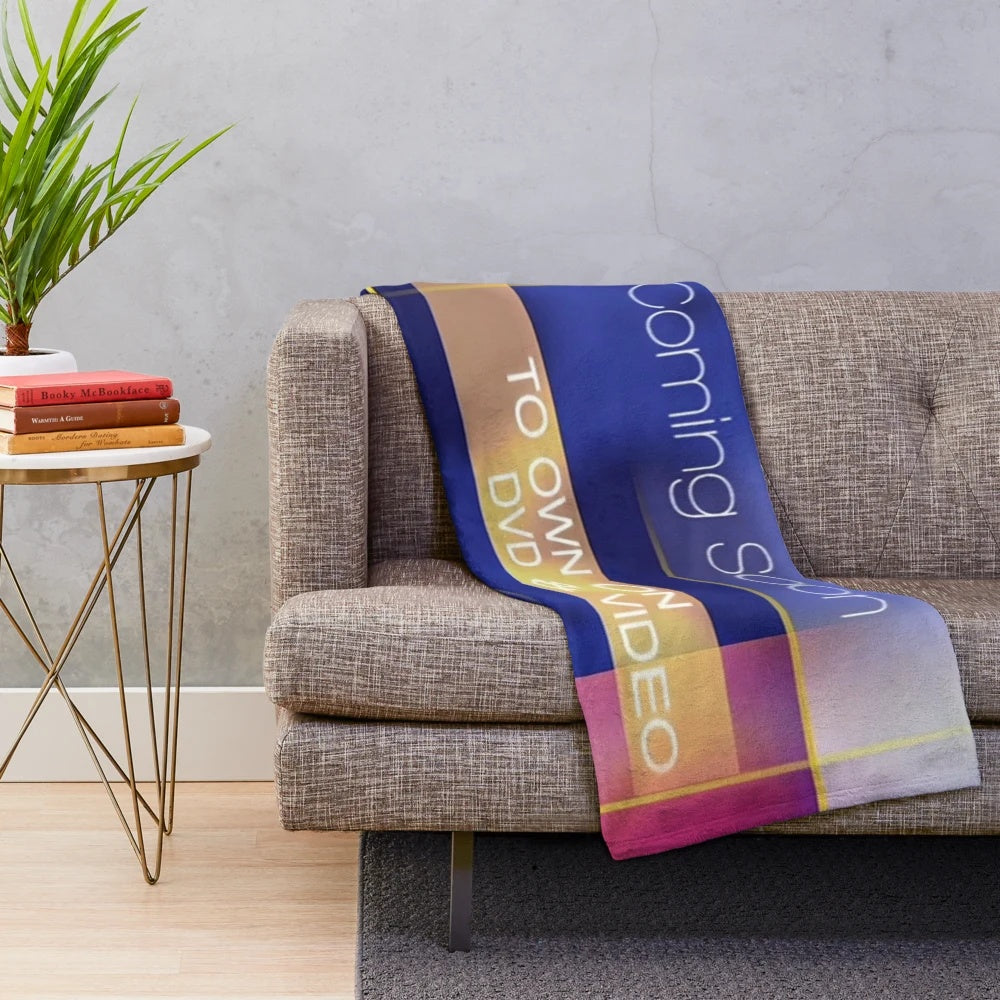 Plush blanket with cinema and movie-themed design