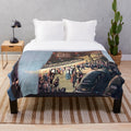 Closeup of a soft, plush blanket with a cinema or theater-themed design