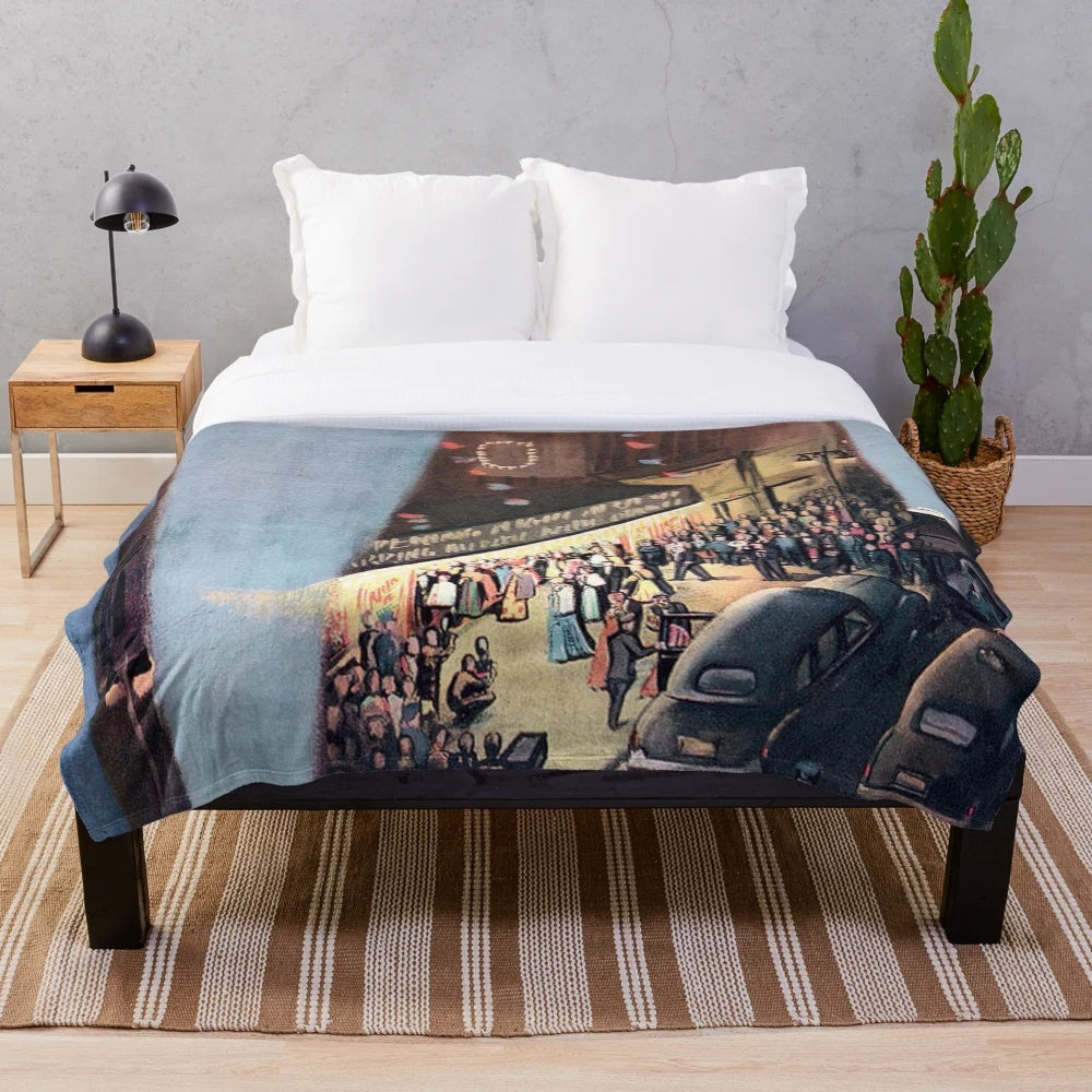 Closeup of a soft, plush blanket with a cinema or theater-themed design