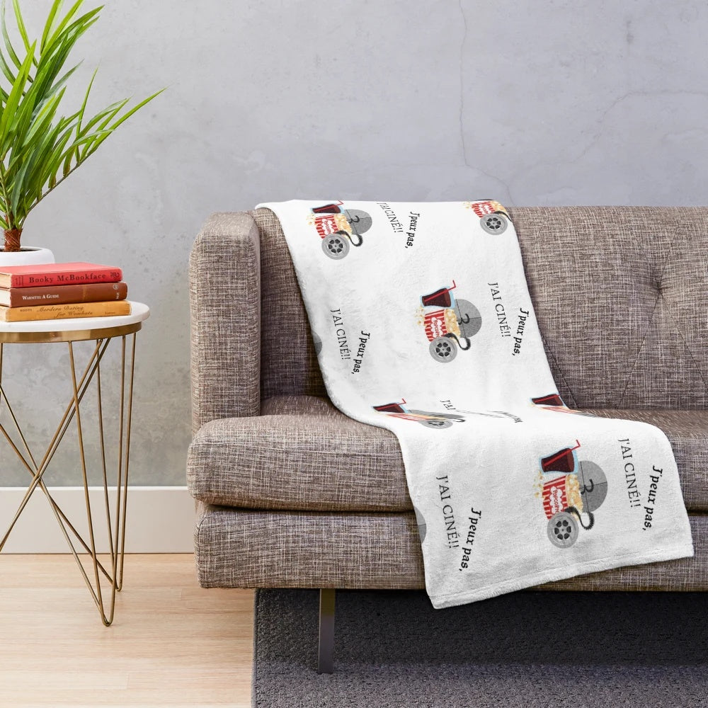 Plush movie-themed blanket featuring classic cinema elements