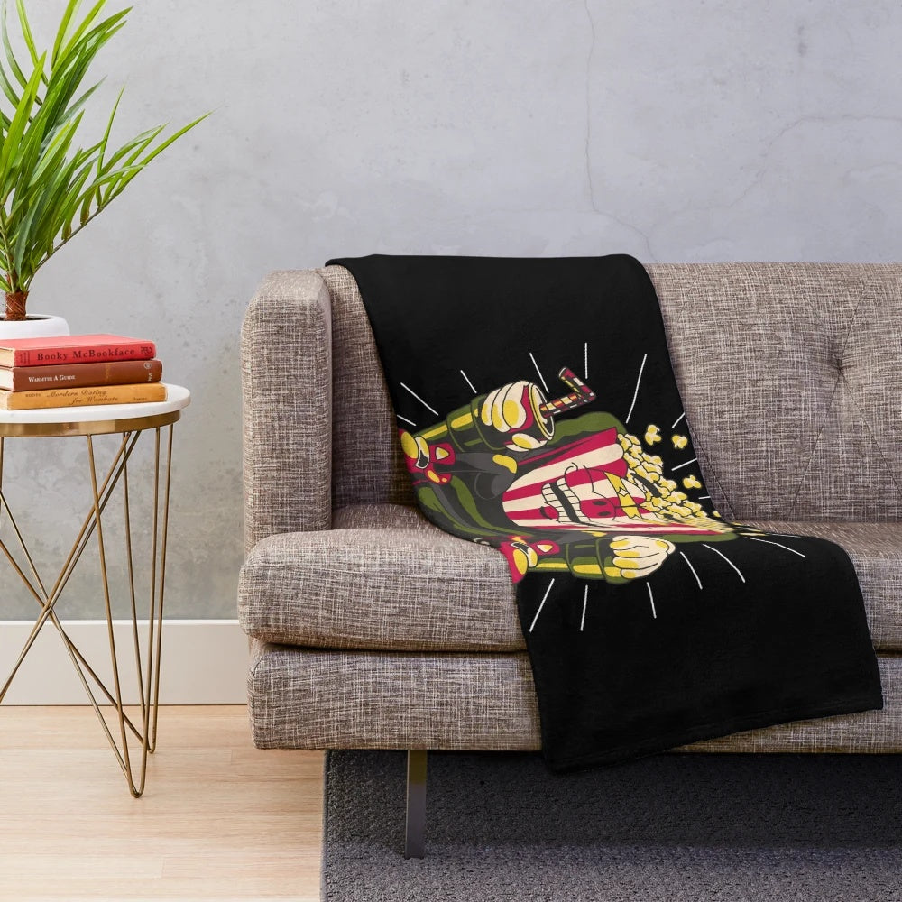 Soft and plush movie theater-themed blanket for movie nights at home