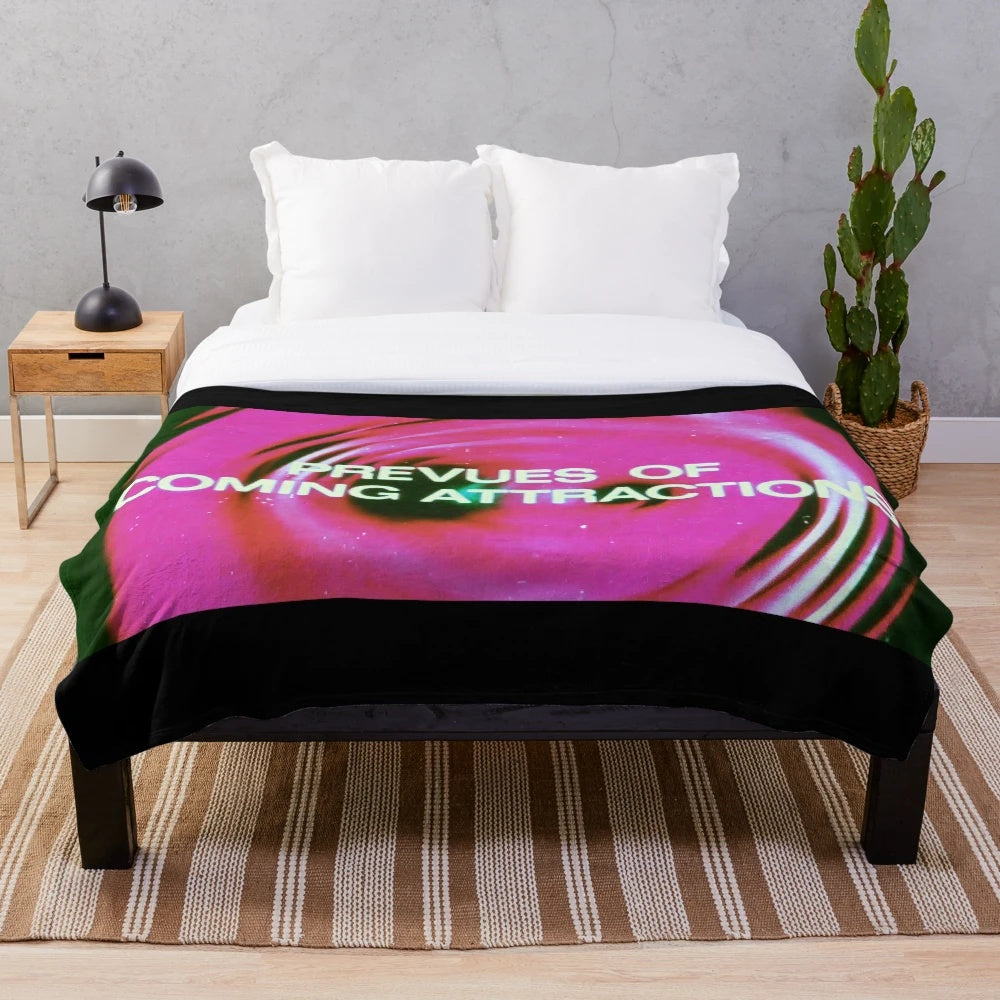 Plush blanket featuring classic cinema imagery for movie enthusiasts