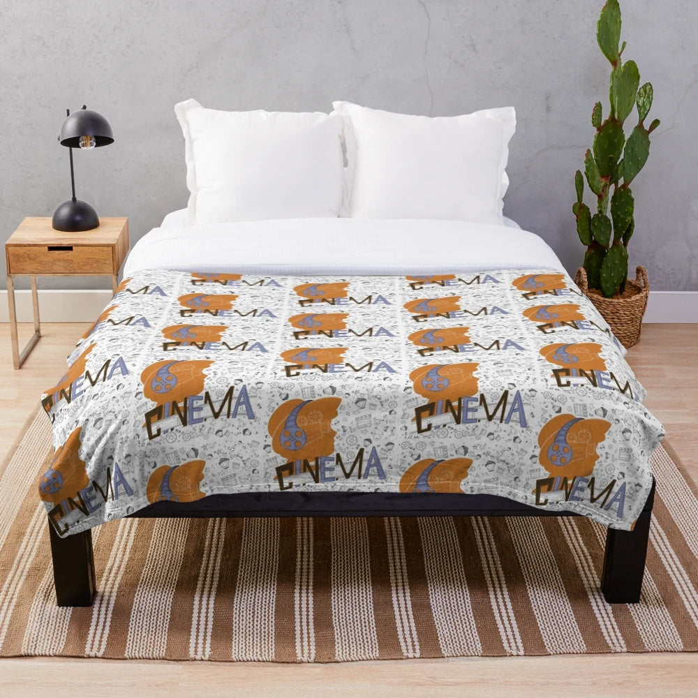 Cinema-themed plush blanket with seamless movie pattern