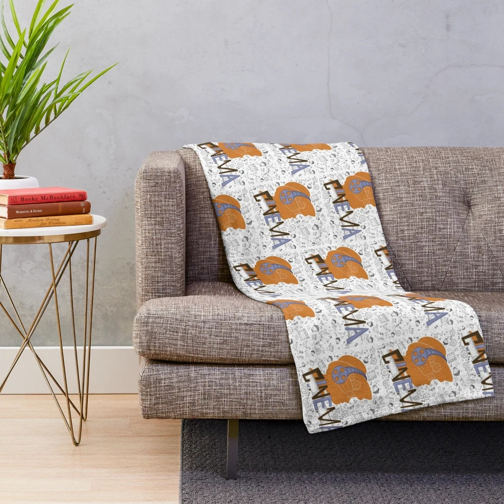 Cinema-themed plush blanket with seamless movie pattern