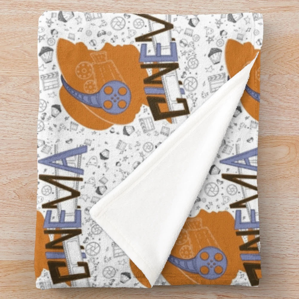 Cinema-themed plush blanket with seamless movie pattern
