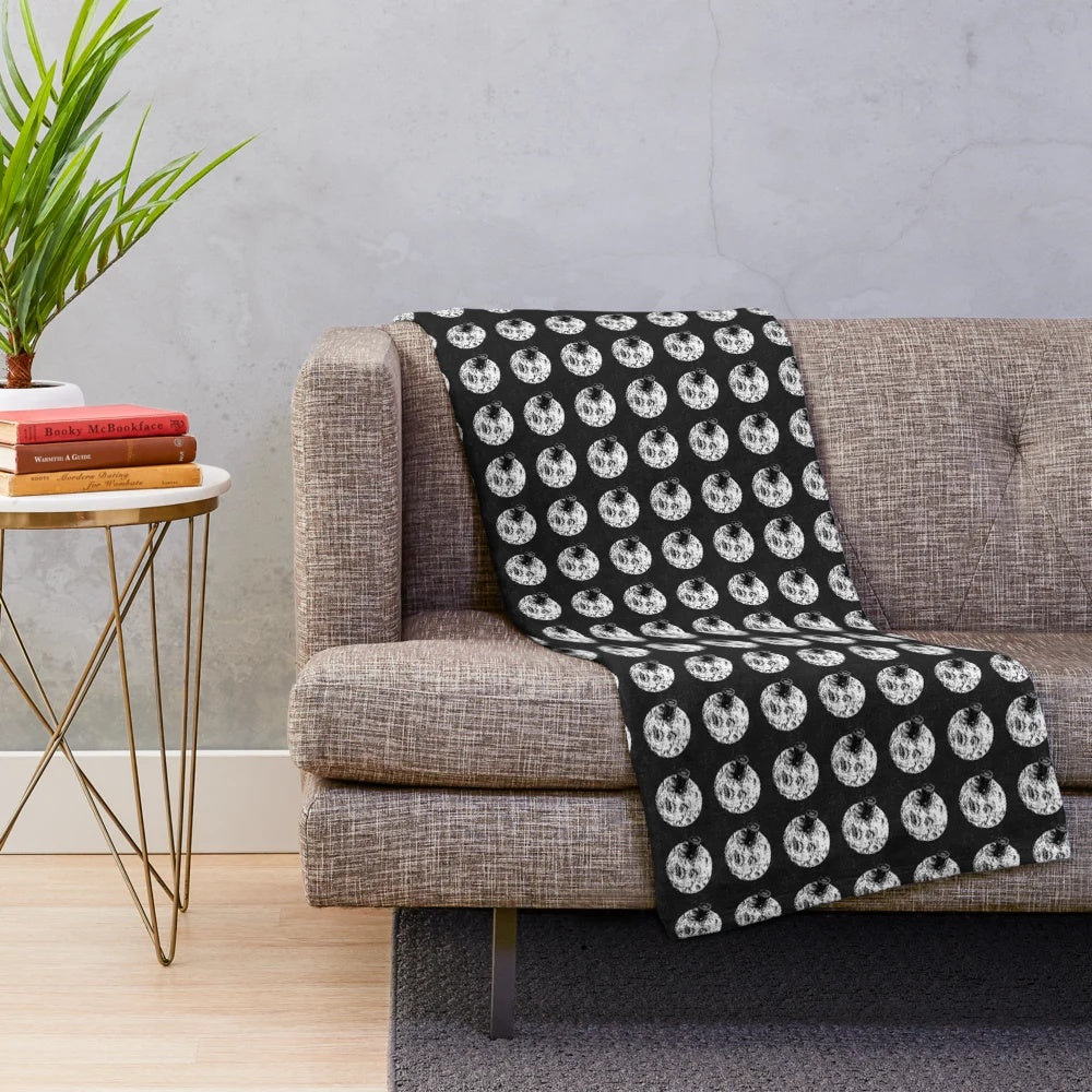 Cinema-inspired plush blanket with movie pattern design