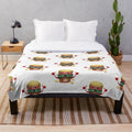 Plush blanket featuring a vintage cinema-inspired popcorn pattern design