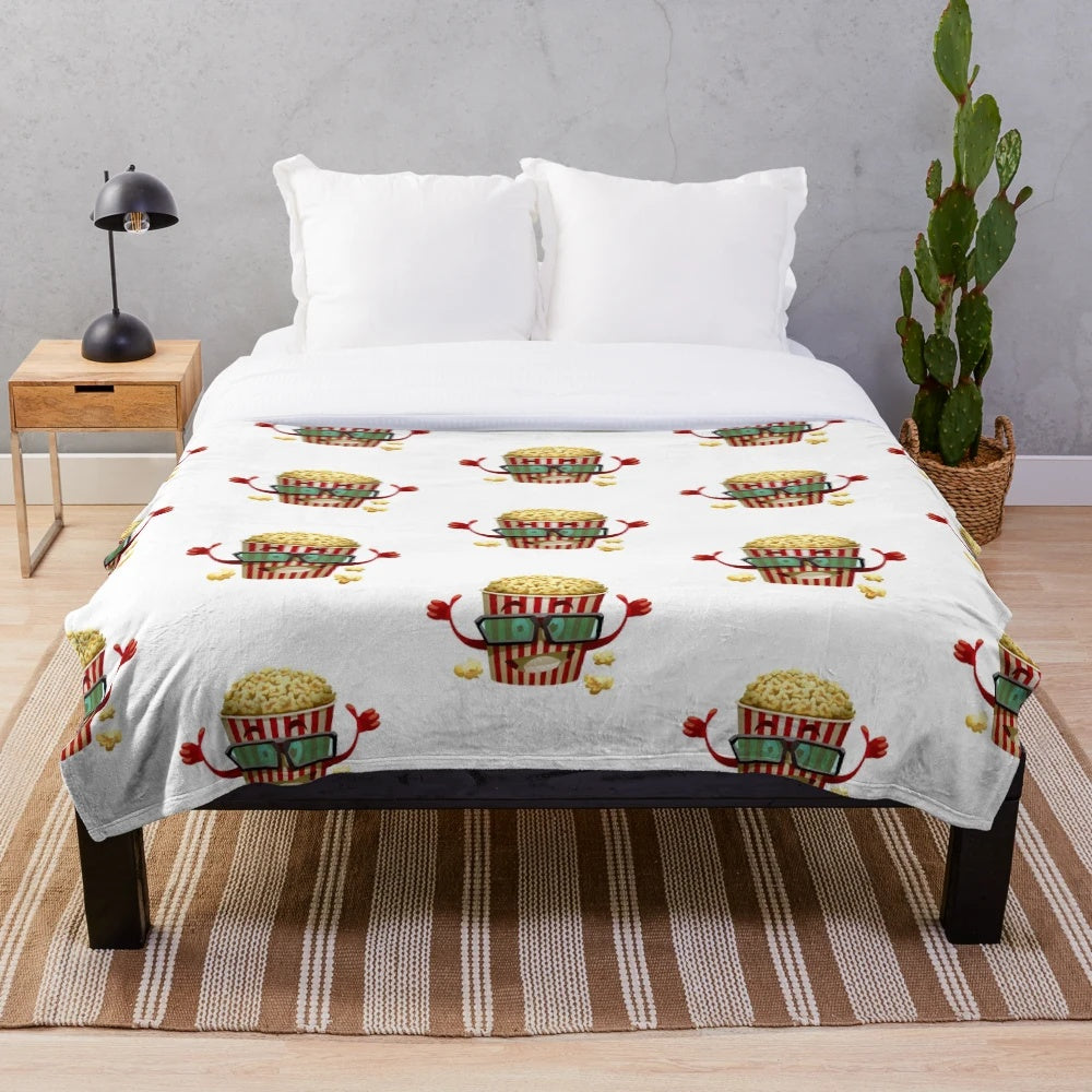 Plush blanket featuring a vintage cinema-inspired popcorn pattern design