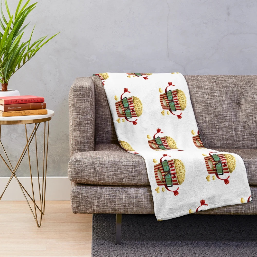 Plush blanket featuring a vintage cinema-inspired popcorn pattern design