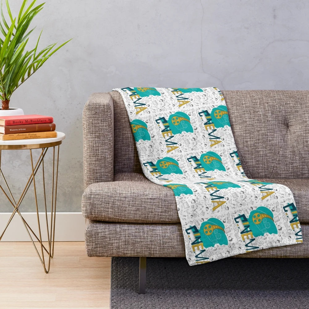 Plush blanket with a cinema-themed seamless pattern