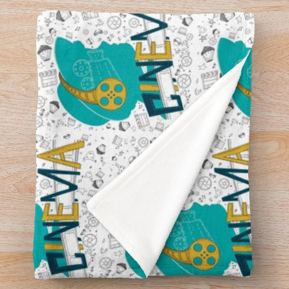 Plush blanket with a cinema-themed seamless pattern