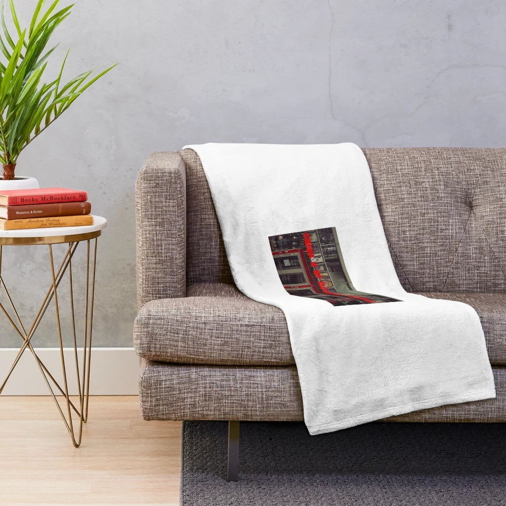 Plush blanket with "cinema is my second world" design for movie enthusiasts