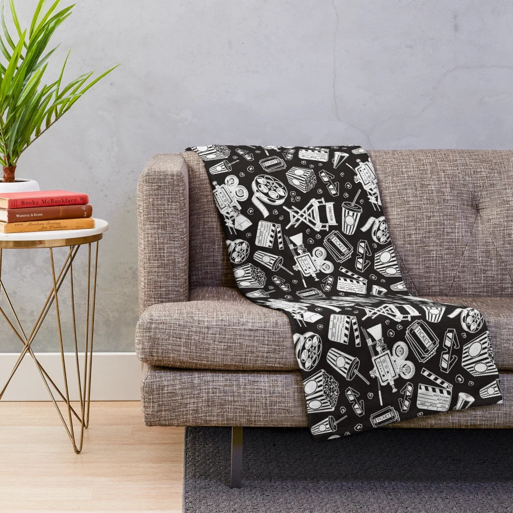 Cinema pattern plush blanket with white background and black design