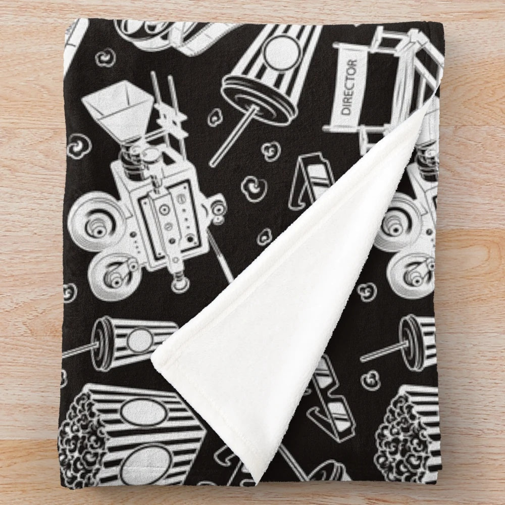 Cinema pattern plush blanket with white background and black design
