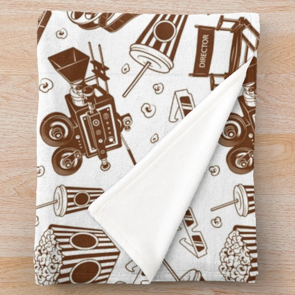Sepia and black plush blanket with a cinema pattern design