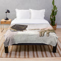 Cozy plush blanket featuring classic cinema elements