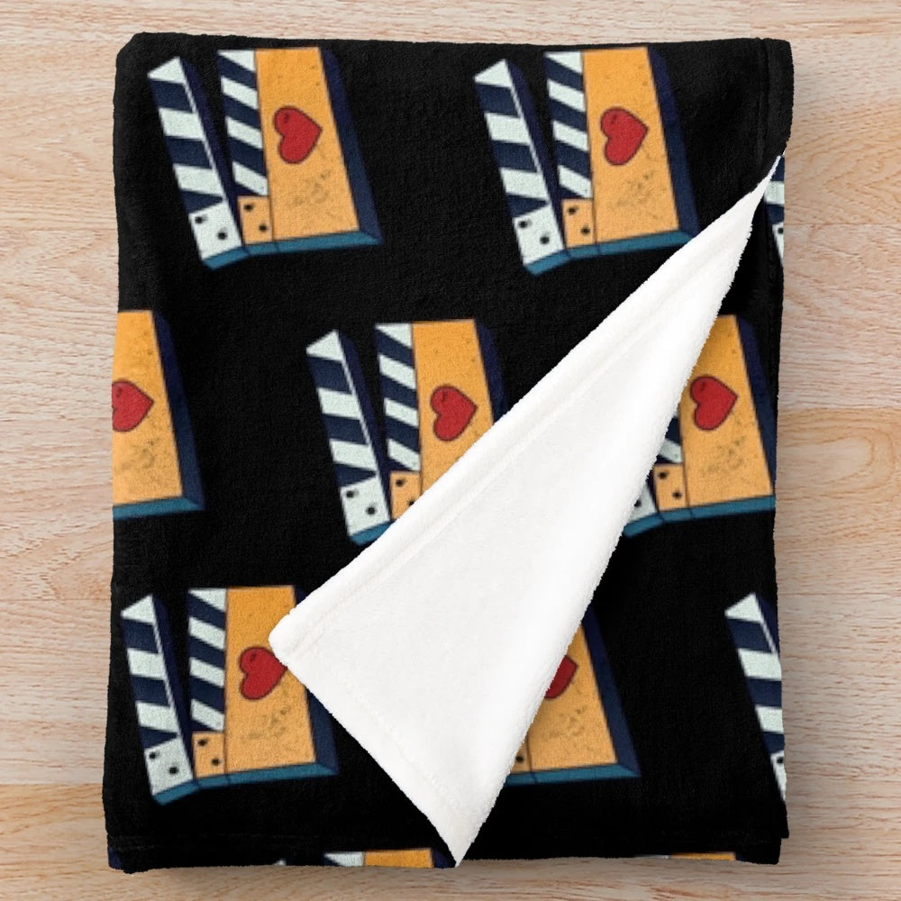 Soft and plush cinema-themed blanket for movie lovers