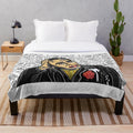 A soft and plush blanket featuring a cinema or movie themed design