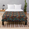 Plush blanket with movie theater and cinema-inspired design