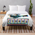 Plush blanket with cinema, movie, and film related graphics and icons