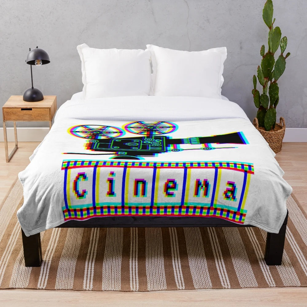 Plush blanket with cinema, movie, and film related graphics and icons