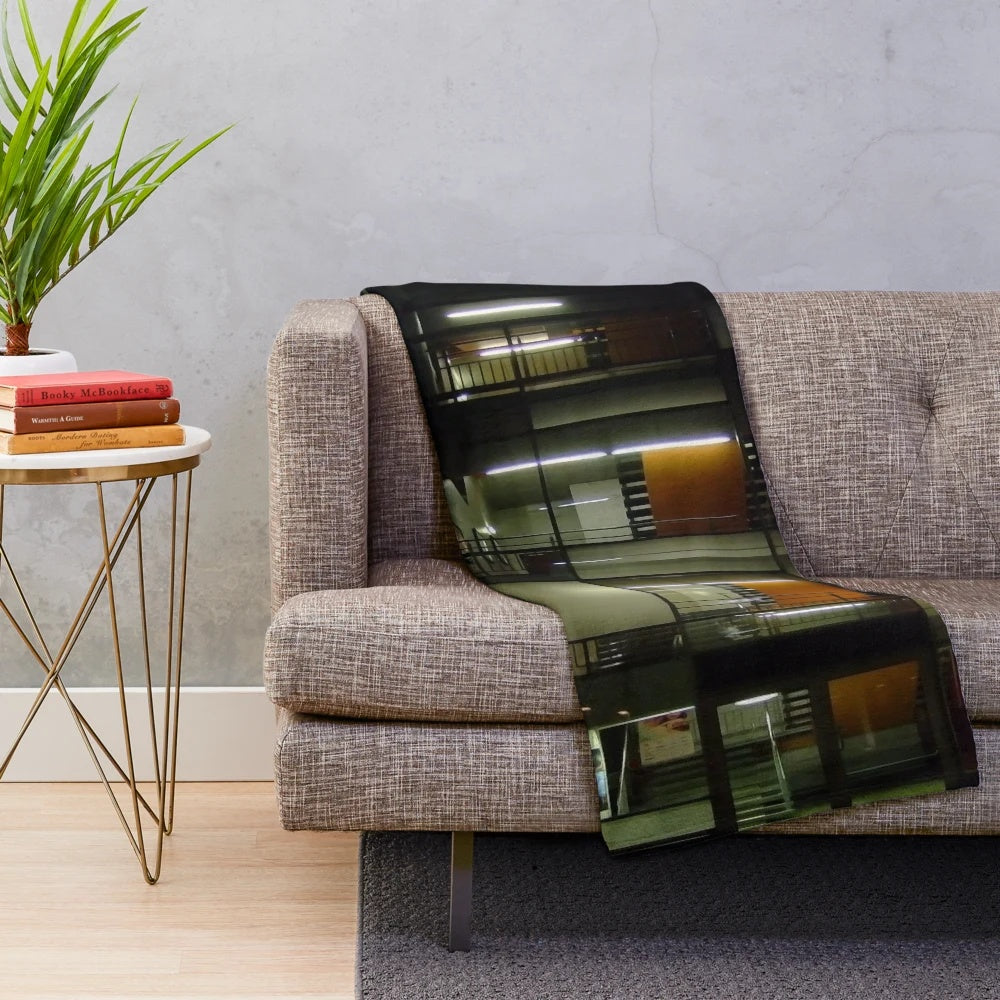 Cozy cinema-themed plush blanket with abstract lines and colors
