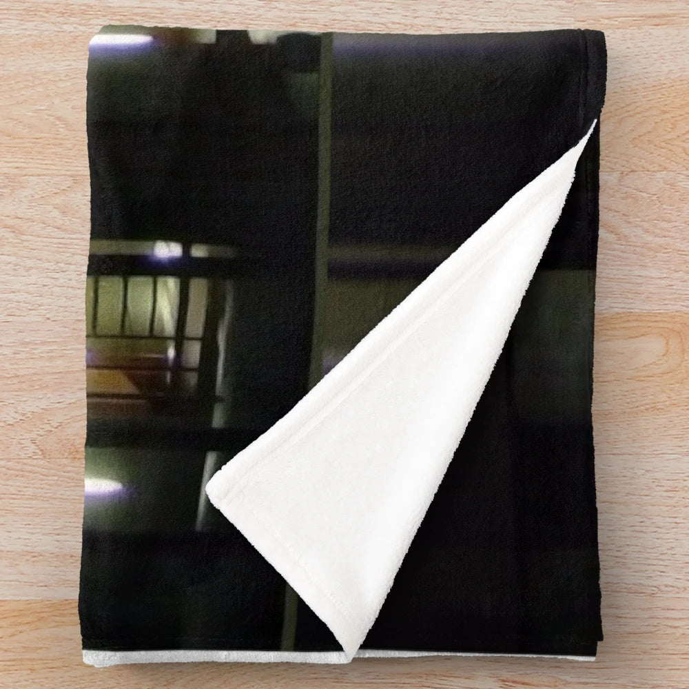 Cozy cinema-themed plush blanket with abstract lines and colors