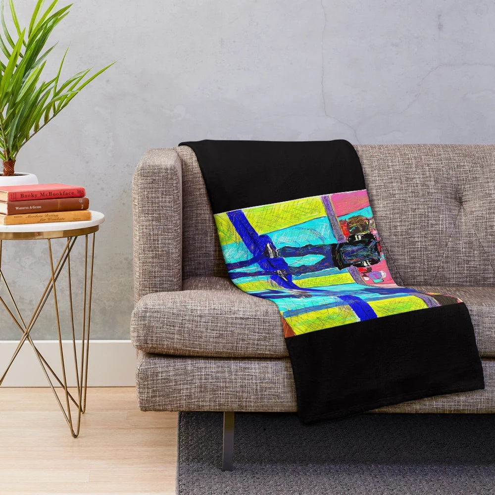 Plush blanket with a cinema-inspired design for a cozy movie-watching experience