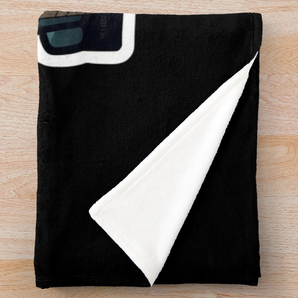 Plush blanket with cinema-inspired design for cozy movie watching