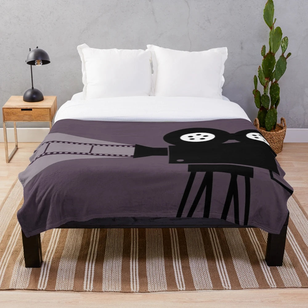 Cinema-themed plush blanket with a soft, cozy texture