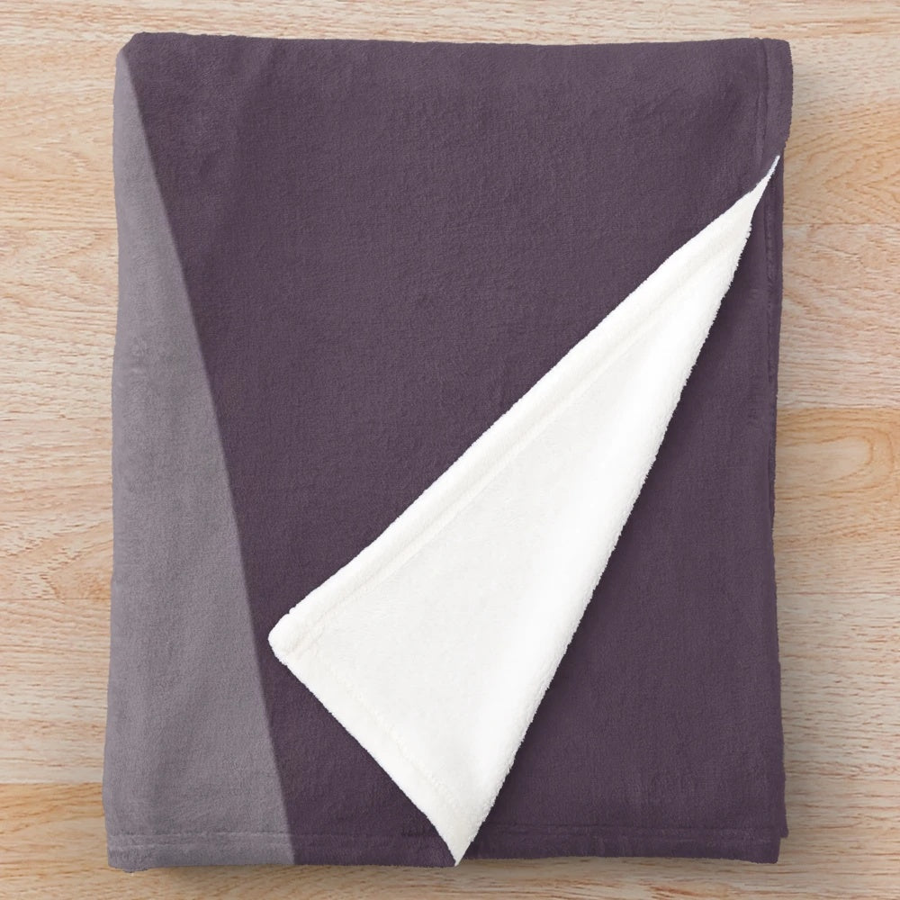 Cinema-themed plush blanket with a soft, cozy texture