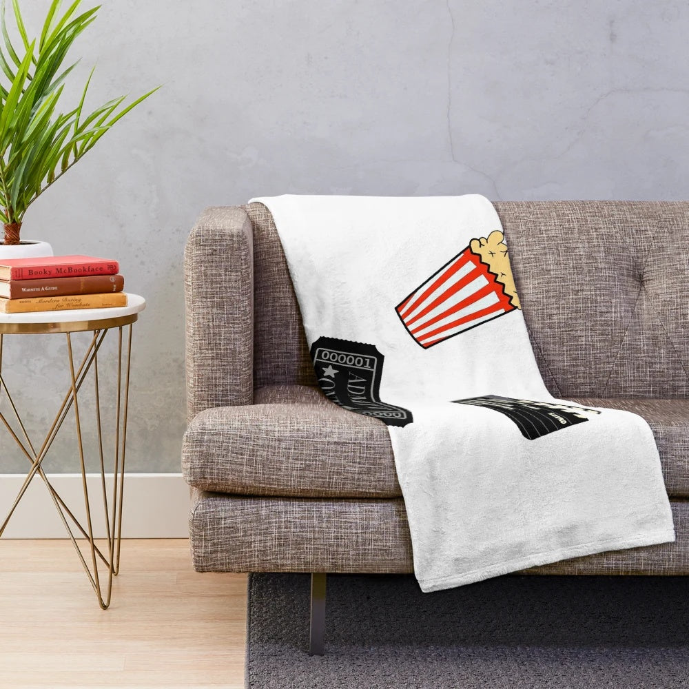 Plush cinema-themed blanket with movie production elements