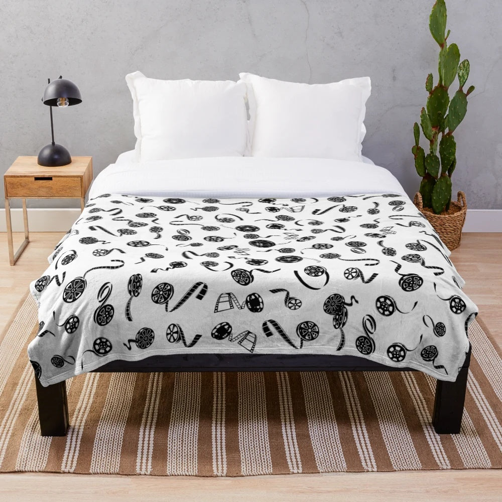 Soft and plush black and white patterned blanket for cinema enthusiasts