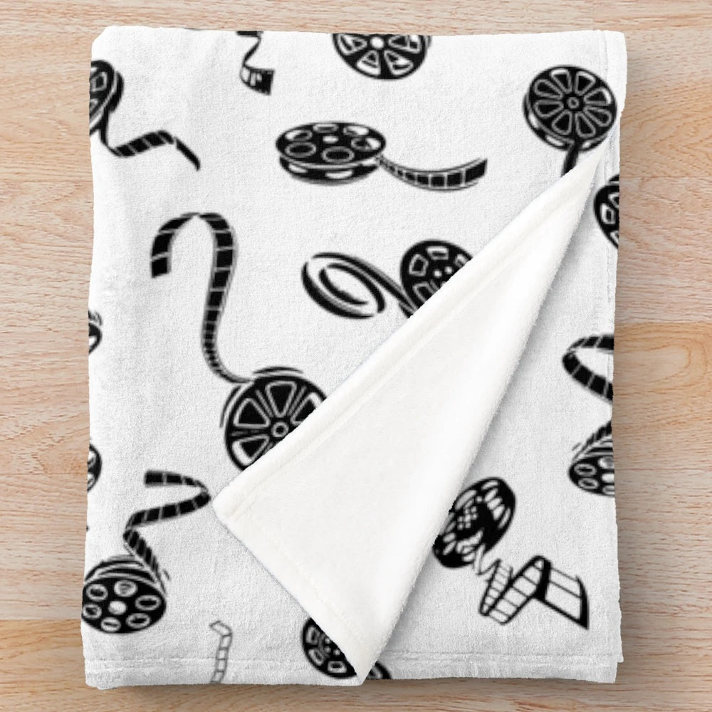 Soft and plush black and white patterned blanket for cinema enthusiasts