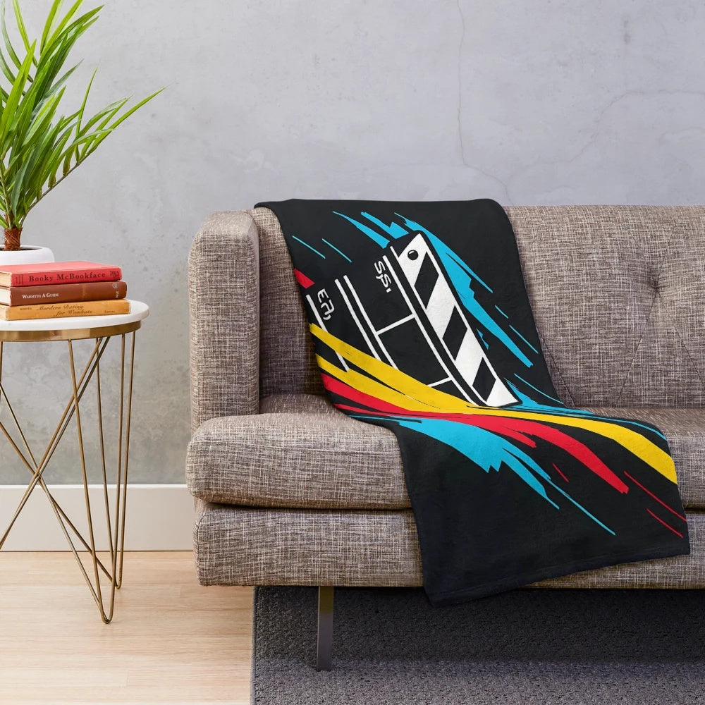 Plush blanket with cinema clapper board print, perfect for movie lovers