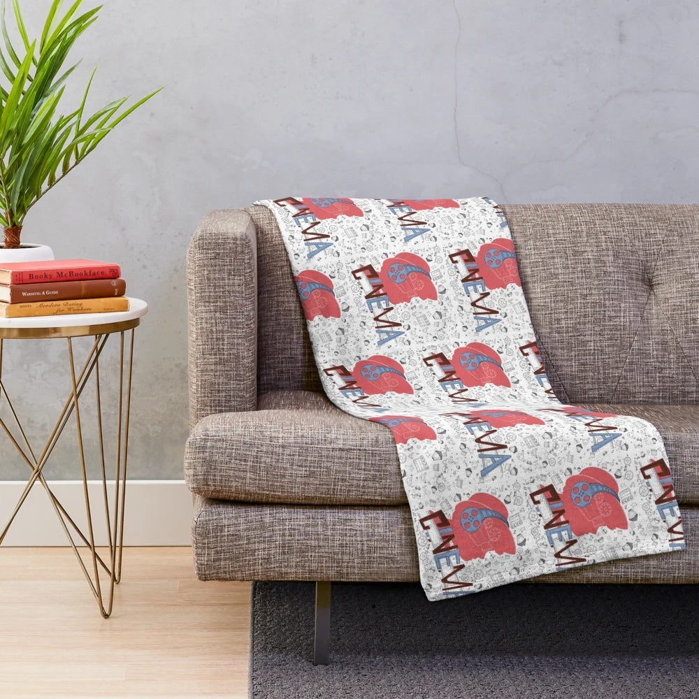 Cinema pattern plush blanket with popcorn, movie tickets, and camera details