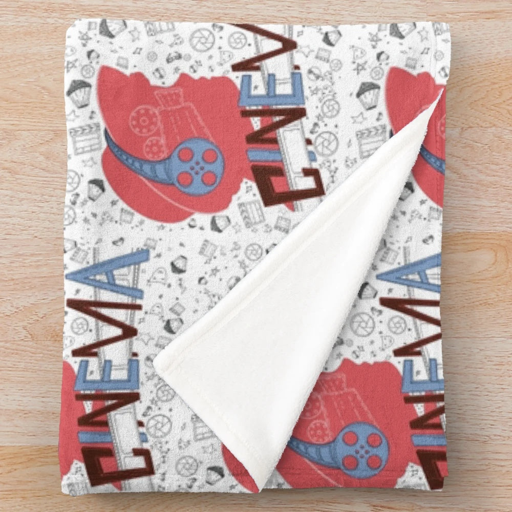 Cinema pattern plush blanket with popcorn, movie tickets, and camera details