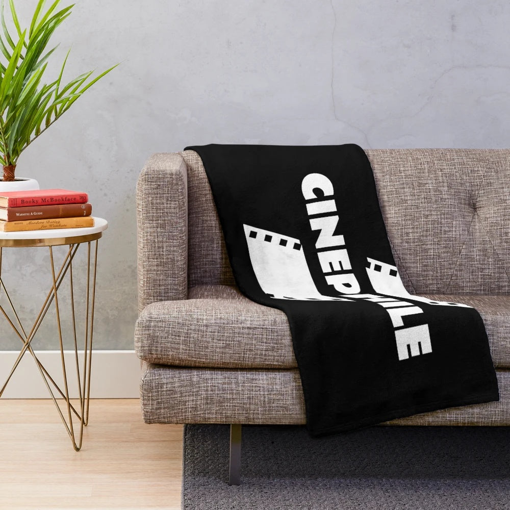 Cinephile plush blanket with a movie theme