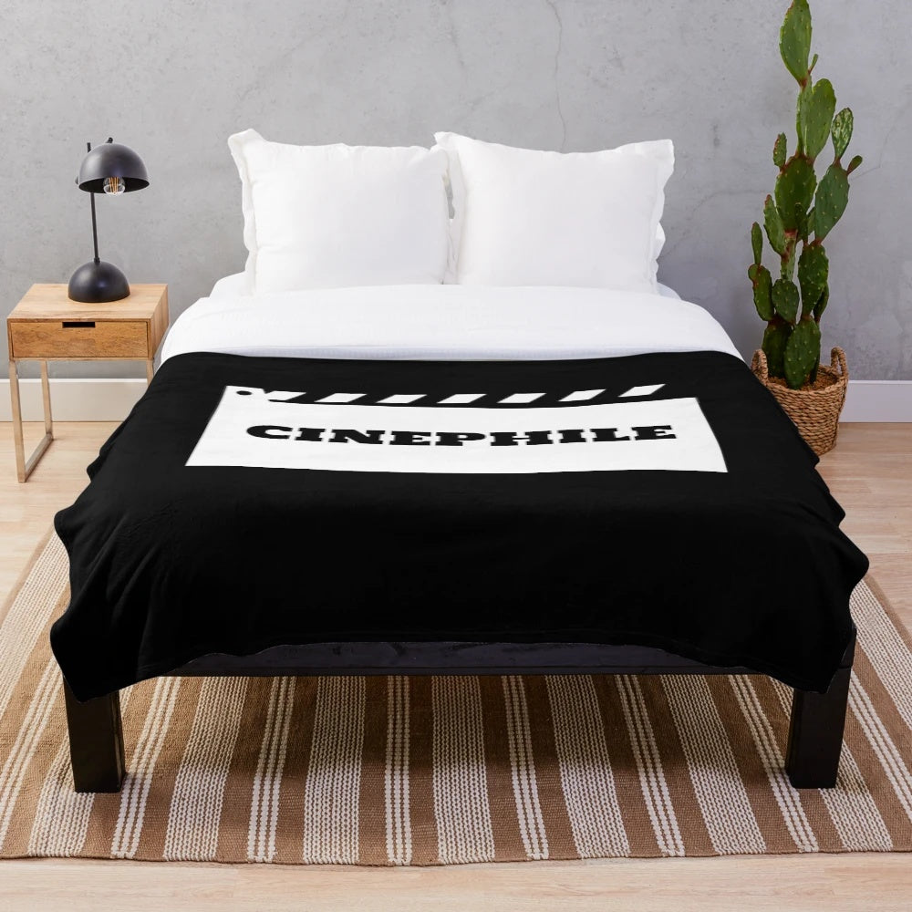 Soft and snuggly plush blanket for cinephiles and movie enthusiasts