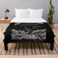 Night circus-themed plush blanket with whimsical circus elements