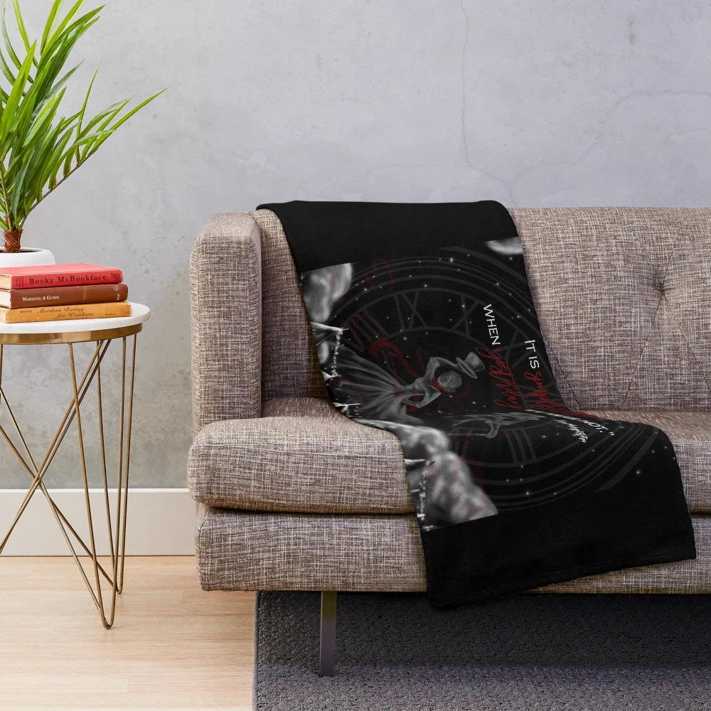 Night circus-themed plush blanket with whimsical circus elements