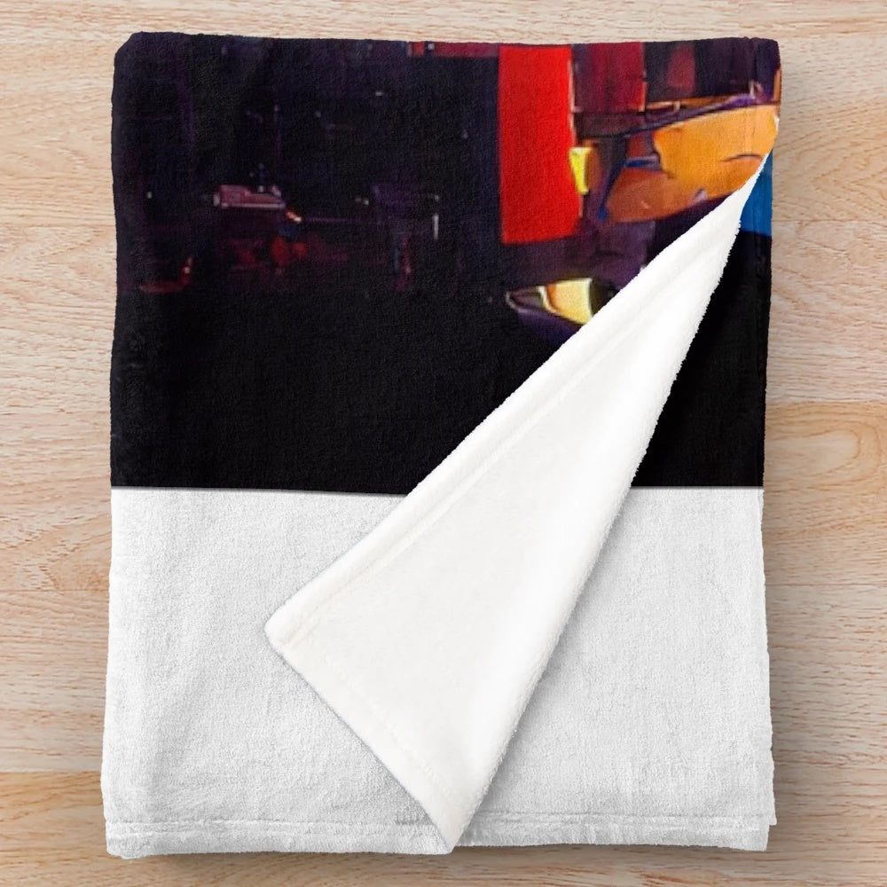 Blue plush blanket with a city-inspired design
