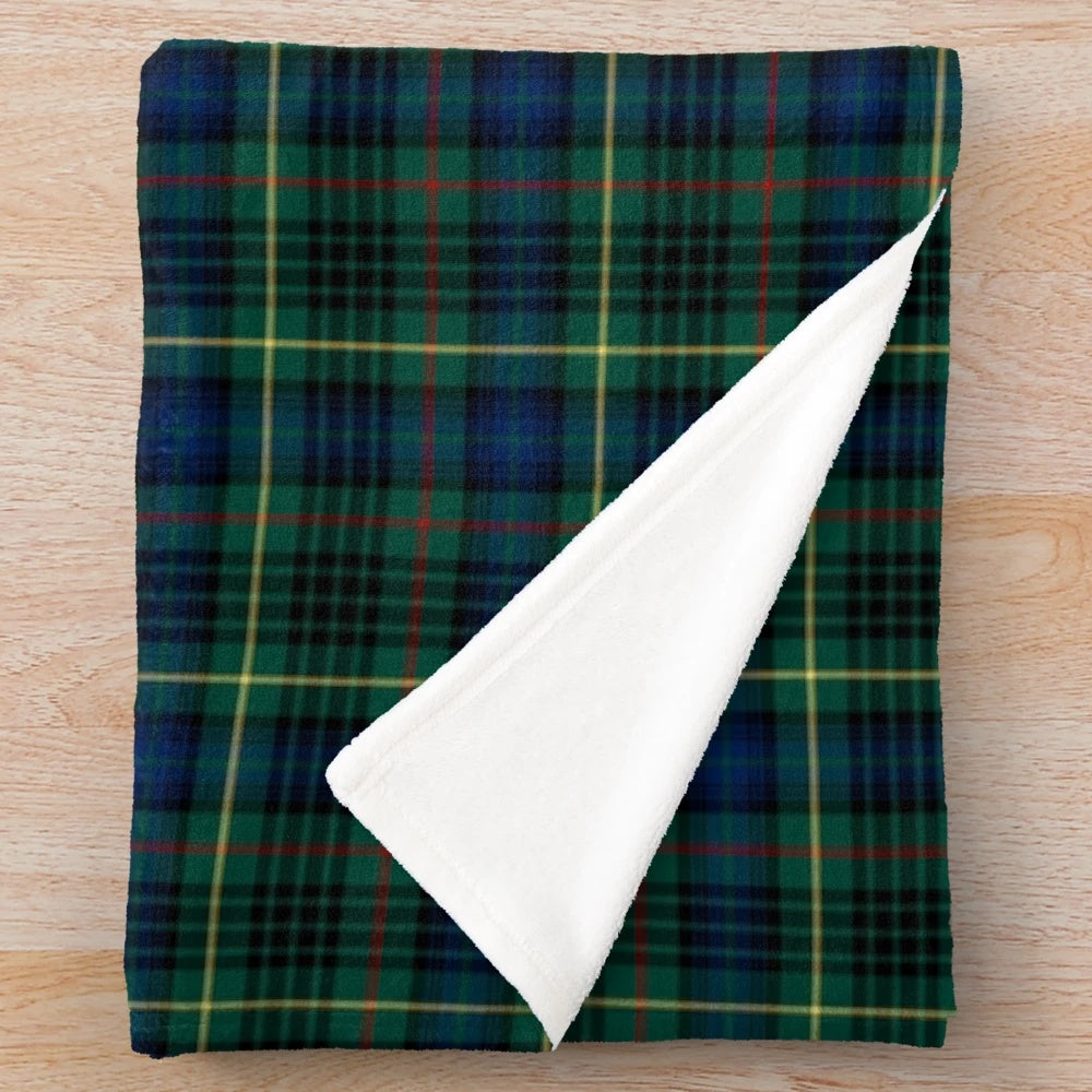 Clan Stewart tartan plush blanket with green and black plaid pattern