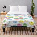 Dango Daikazoku - The Big Dango Family Plush Blanket featuring characters from the anime series Clannad