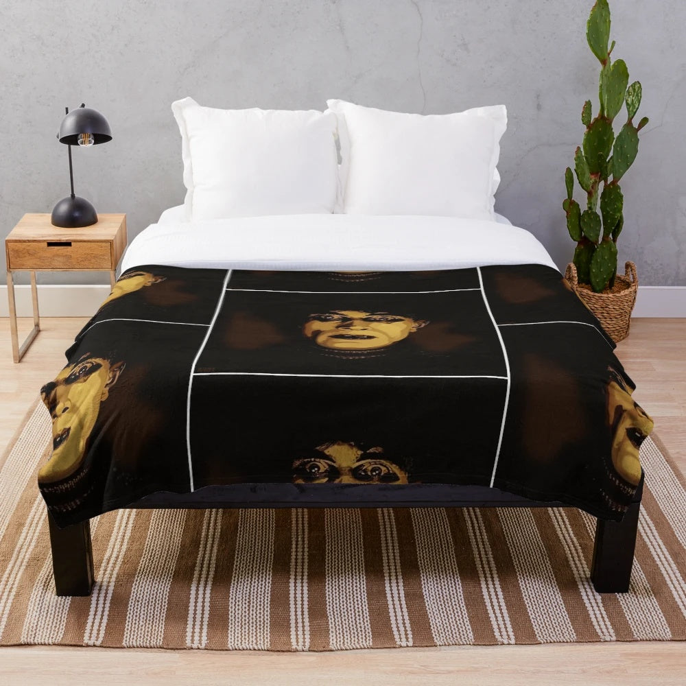 Classic cinema-inspired plush blanket featuring horror and silent film elements