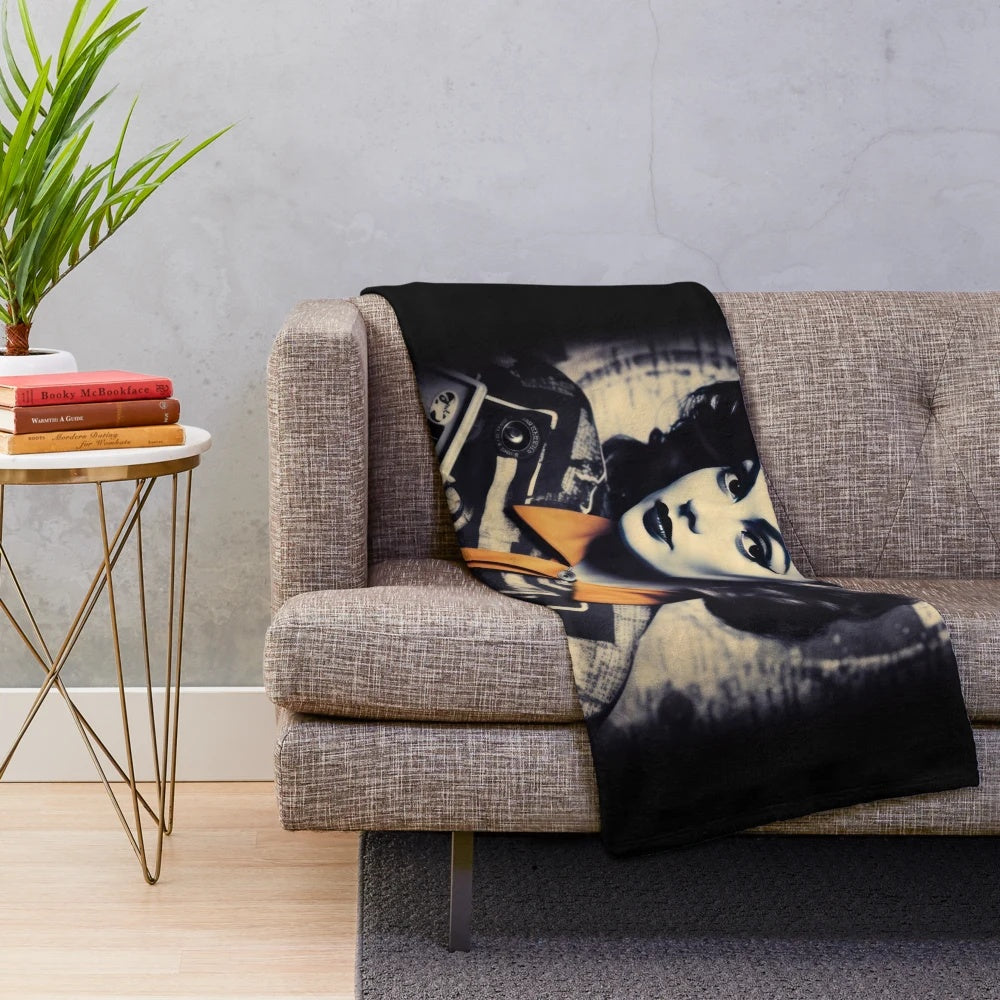 Retro-inspired plush blanket with classic movie imagery