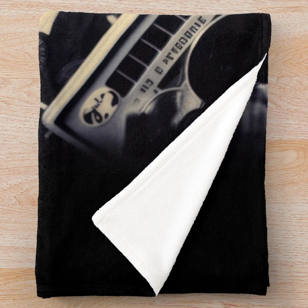 Retro-inspired plush blanket with classic movie imagery