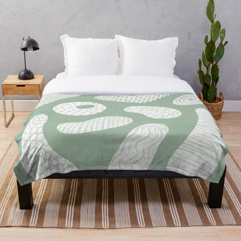 Soft plush blanket featuring colorful climbing holds design